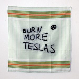 'Burn more teslas', mouchoir brodé