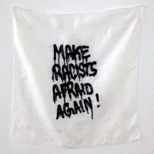 "Make racists afraid again !" (série "les pleurs de l'aube"), broderie sur mouchoir, 43 x 43 cm, 2025.